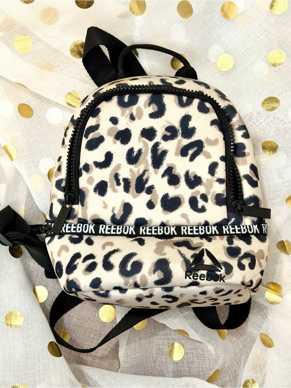 Reebok Leopard Print Mini Backpack in Cream and Black